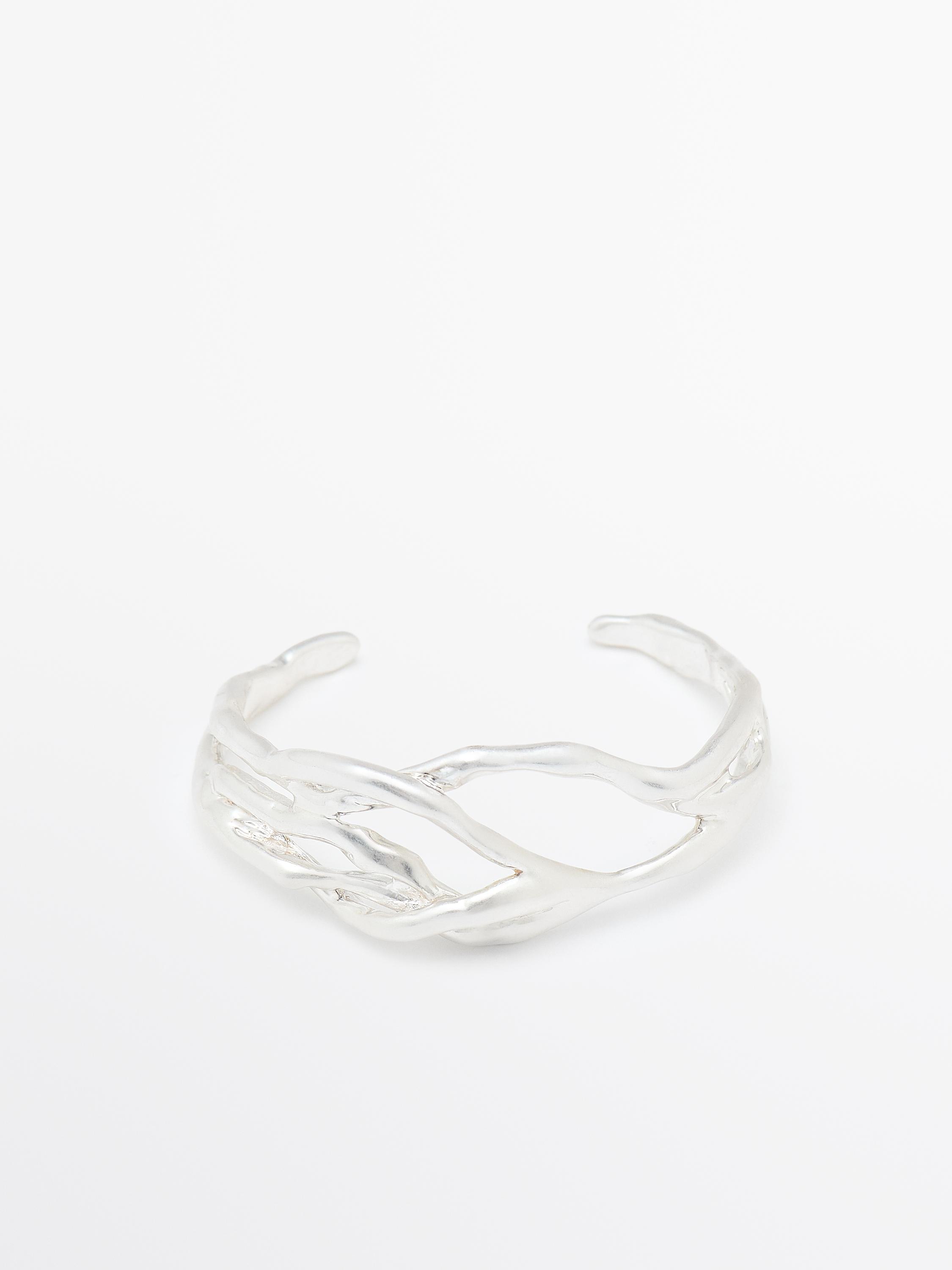 Bracelet métallique abstrait